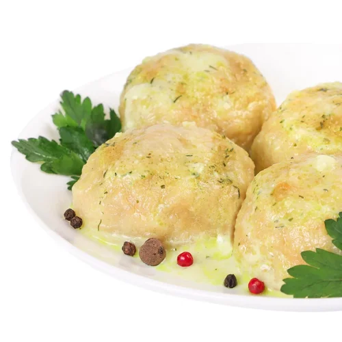 Тефтелі рибні в молочному соусі із зеленню