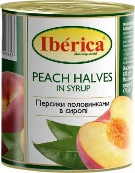 Консервовані половинки персиків Iberica в легкому сиропі 820г