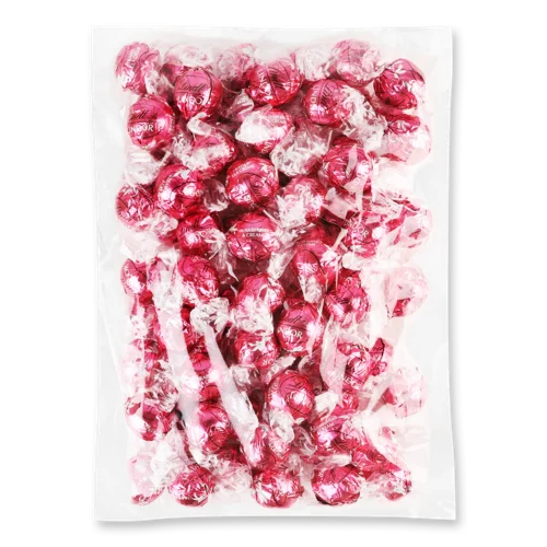 Цукерки В Білим Шоколаді З Полуничною Начинкою Lindor Lindt, м/у 1кг