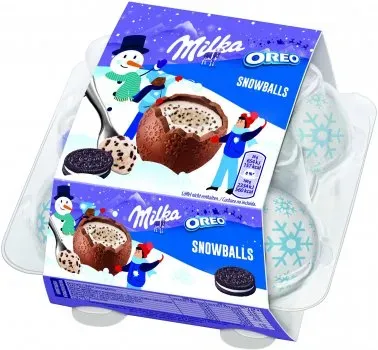 Фігурний молочний шоколад Milka Snow Balls з кремовою молочною начинкою і кусочками печенья Орео 112г