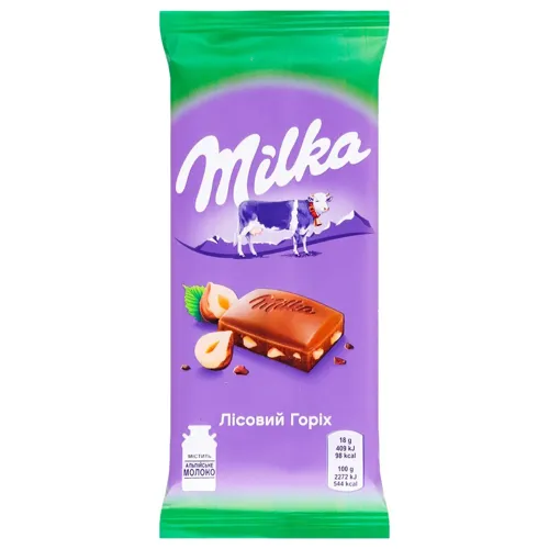 Шоколад молочний «Milka» з подрібненими лісовим горіхом 90г