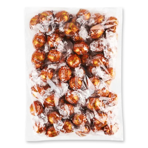 Цукерки Молочного Шоколаду З Шматочками Фундука Lindor Lindt, м/у 1кг