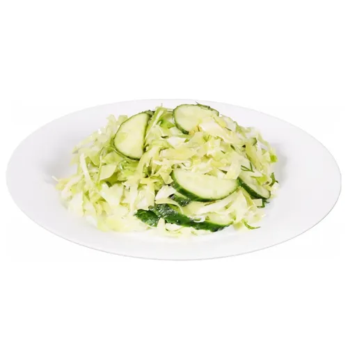 Салат Весняний з молодої білокачанної капусти, огірків та зелені